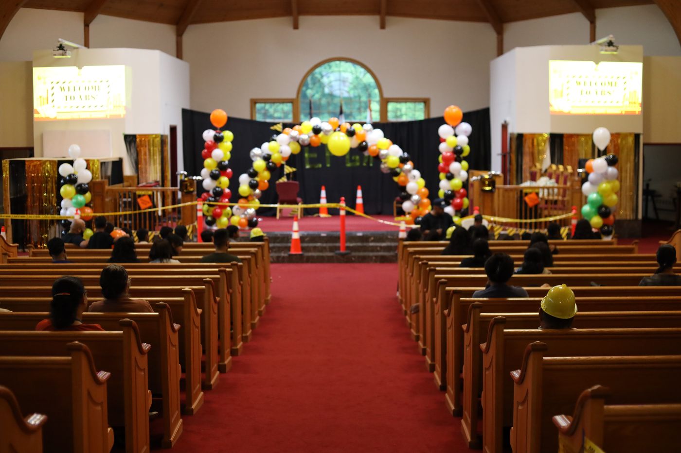 Children and families seated in the sanctuary during Vacation Bible School